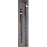 Rustic geometrically carved walking stick,