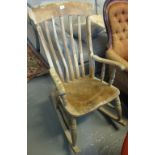 19th Century elm slat backed kitchen rocking armchair. (B.P. 24% incl.