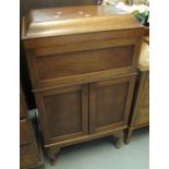 Early 20th Century mahogany gramophone case with blind panelled doors on cabriole legs.