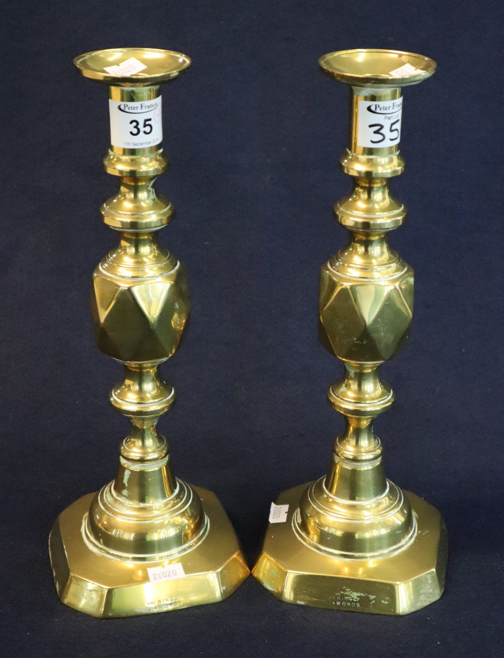 Pair of brass king of diamonds candlesticks. 31cm high approx. (2) (B.P. 24% incl.