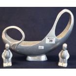 Aluminium fish shaped pedestal fruit bowl, together with two cast aluminium angel figures. (3) (B.P.