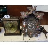 Oxidised brass Metamec bracket style clock, together with a wooden cuckoo clock. (2) (B.P. 24% incl.
