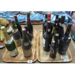 Two trays of alcohol to include; Harvey's sherry, Chateau Neuf du Pape vintage 1973,