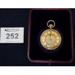 18ct gold fancy keyless fob watch with engine turned Roman face, boxed. (B.P. 24% incl.