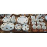 Three trays of Staffordshire bone china tea and dinnerware items on a white and gilded ground with