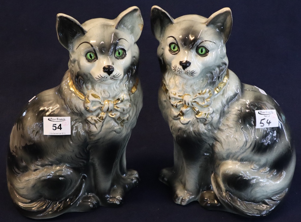 Pair of early 20th Century Staffordshire pottery grey seated cats with over gilded and painted