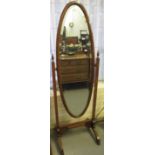 Early 20th Century oak framed oval bevel plate cheval type mirror. (B.P. 24% incl.