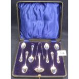 Cased set of six teaspoons, together with sugar nips and sifter spoon. Birmingham hallmarks. (B.P.