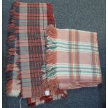 Two fringed check blankets in various colours. (2) (B.P. 24% incl.