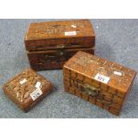 Three Eastern carved wooden boxes, one containing a collection of furniture mounts. (3) (B.P.