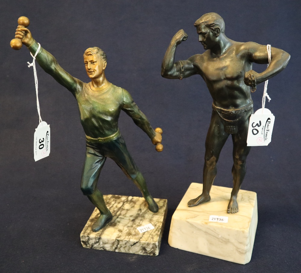 Pair of 20th Century bronzed metal figures of male athletes on marble bases. 33cm high approx.