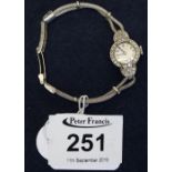 Kenwell 9ct white gold diamond set ladies cocktail watch on 9ct white gold rope bracelet, boxed.