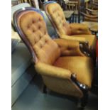 Two similar walnut upholstered show frame button back fireside armchairs. (2) (B.P. 24% incl.