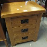 Modern solid wood small straight front chest of three drawers on stile feet. (B.P. 24% incl.