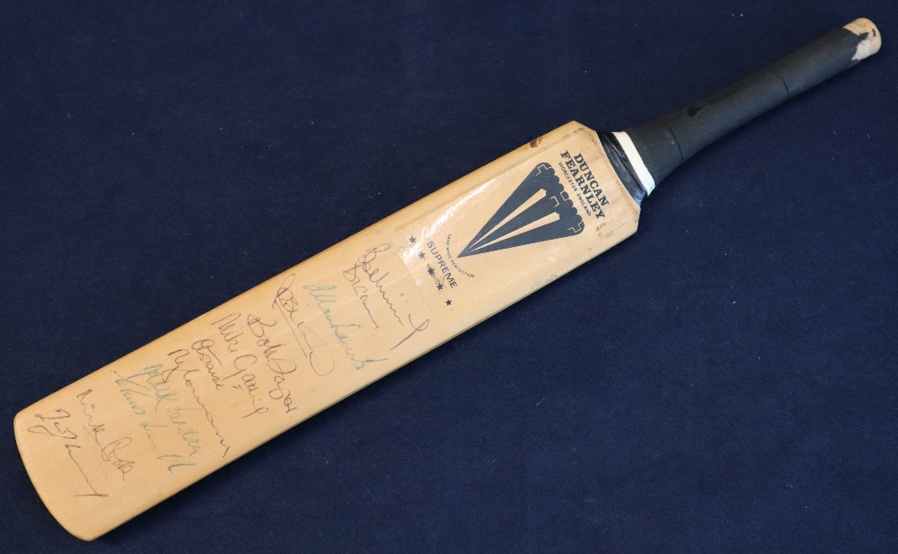 Duncan Fearnley miniature signature cricket bat with signatures of the England team,