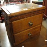 Small oak chest or jewellery box having two dummy drawers with hinged lid. (B.P. 24% incl.