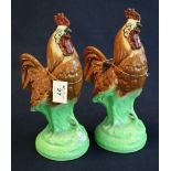Two Staffordshire pottery studies of red roosters on circular bases. Unmarked. (2) (B.P. 24% incl.