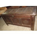 18th Century oak coffer having three carved panels on stile feet. (B.P. 24% incl.