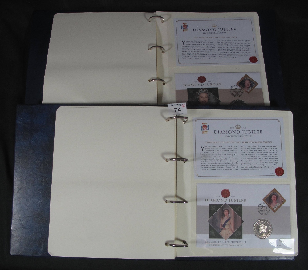 Collection of British Commonwealth Diamond Jubilee coin covers in two blue albums. (B.P. 24% incl.