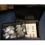 Tin box containing assorted GB coinage, first day covers including World Cup 1966, album of stamps,