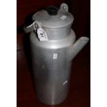 The Caracan aluminium cylindrical milk or water can with folding bakelite handle. 42cm high approx.