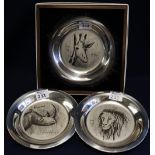 John Pinches Ltd sterling silver circular plates after Bernard Buffet; lion, giraffe and rhino.