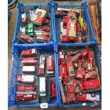 Four trays of assorted diecast model vehicles, fire engines, vans, Corgi minivan 97337,