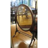 19th Century mahogany framed oval toilet mirror. (B.P. 24% incl.