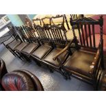 Set of six early 20th Century oak slat back dining chairs with bobbin turned supports.