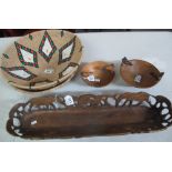 Assorted carved wooden tribal souvenir type items to include two baskets, bowls with giraffe heads,