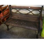 Modern slatted garden bench with cast metal supports. (B.P. 24% incl.