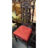Late Victorian carved oak high back hall chair. (B.P. 24% incl.