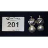 A pair of blister pearl and diamond set earrings with French fittings. (B.P. 24% incl.