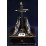 19th Century stained pine primitive crucifix design watch holder with acorn finials and two boots