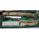 Large cased carving set with horn handles. (B.P. 24% incl.