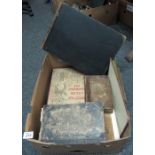 A box of assorted books and ephemera to include; Dennis Wheatley 'Who killed Robert Prentice' book,