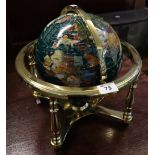 Small modern brass framed semi-precious stone set terrestrial globe. (B.P. 24% incl.