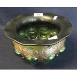 Late 19th Century Art Nouveau iridescent green glass and beaten copper pedestal bowl with bulbous