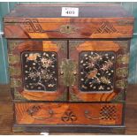 Oriental design parquetry table top cabinet. (B.P. 24% incl.