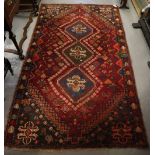 Middle Eastern Abadeh geometric red ground rug. 40 x 145cm approx. (B.P. 24% incl.