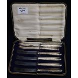 Cased set of silver handled butter knives of the same design. (6 + 1) (B.P. 24% incl.