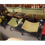 A pair of Spanish style wrought iron bucket type seats with fabric decoration. (2) (B.P. 24% incl.
