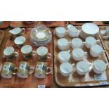 Fourteen-piece Wedgwood bone china Suzie Cooper design Old Gold Camelia coffee set together with a