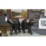 Two similar African carved ebony studies of trumpeting elephants. (2) (B.P. 24% incl.