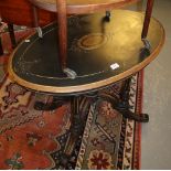 Victorian walnut and ebonised centre table on quatreform base,