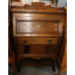 Early 20th Century oak fall front bureau of narrow form with under tier. (B.P. 24% incl.
