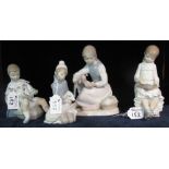 Three Nao Spanish porcelain figures of young children at work and with birds,