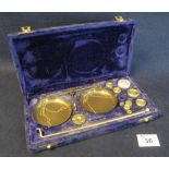 Velvet cased set of chemical balance miniature scales and weights. (B.P. 24% incl.