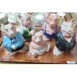 Set of five novelty money boxes by Wade in the form of pigs. (5) (B.P. 24% incl.