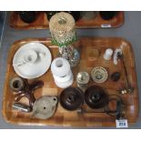 Tray of mixed items including wooden and ceramic candlesticks, antique oil lamp, small paste dishes,